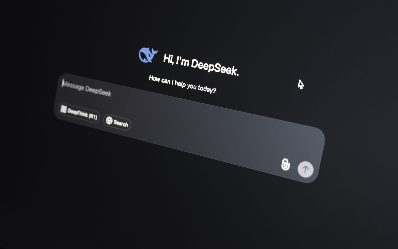 An AI chat assistant's welcome screen with an empty message box, in dark mode