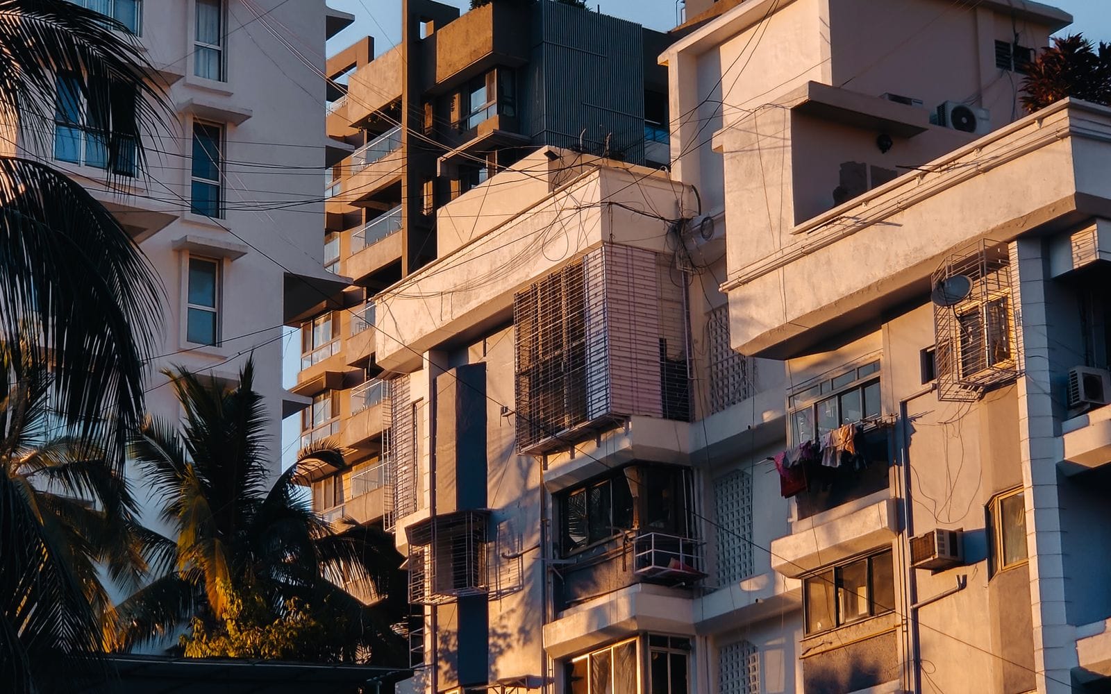 Residential apartment buildings in an Indian city seen from street level